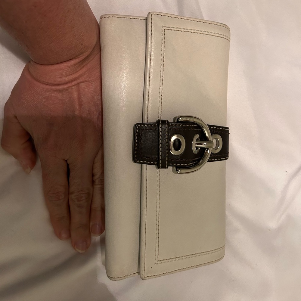 Coach, off white and brown large wallet with removable checkbook insert.
